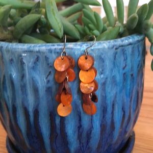 Orange dangly earrings